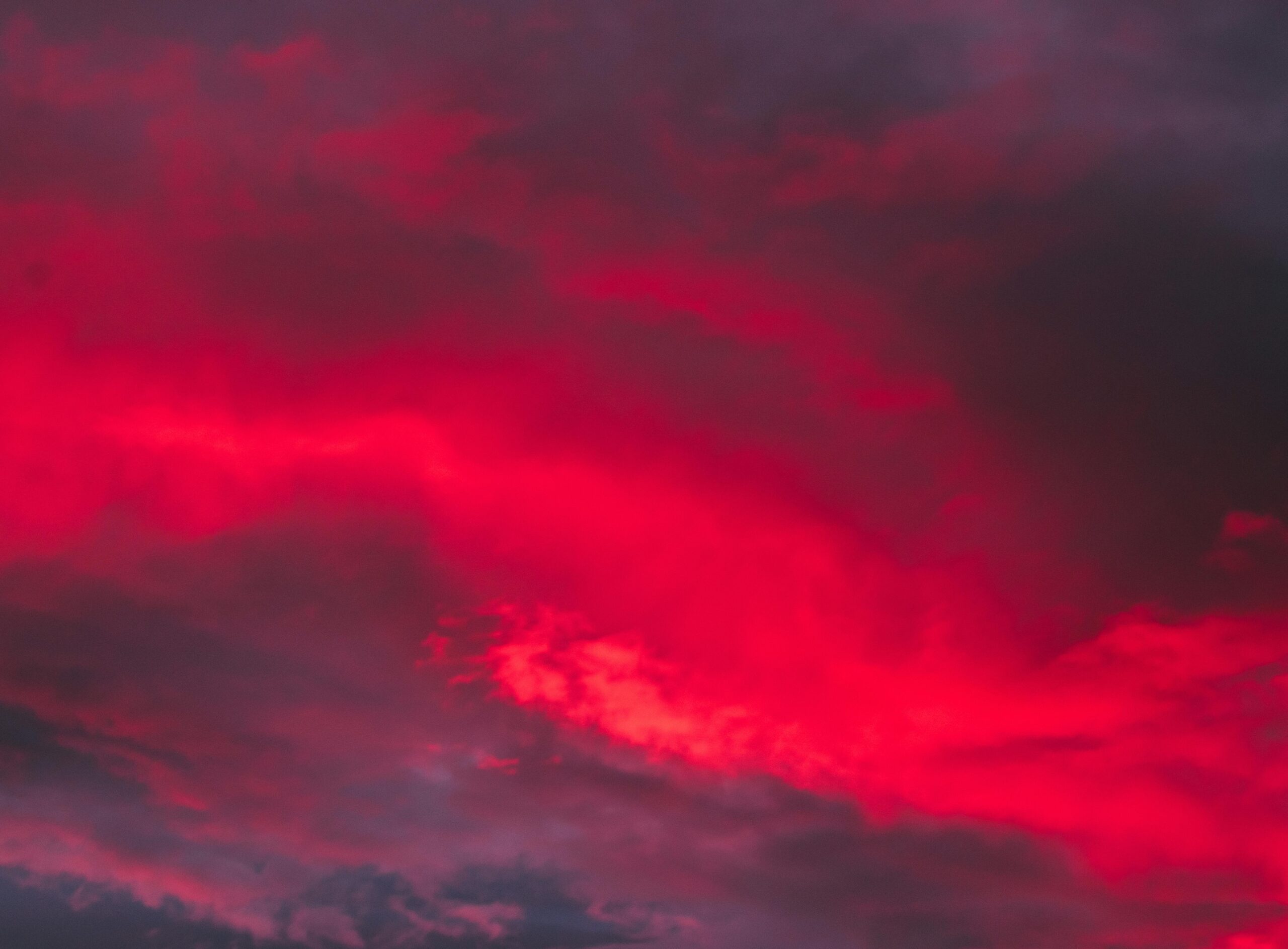 Captivating red clouds at dusk creating a dramatic sky scene.