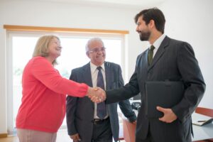 Man and Woman Shaking Hands